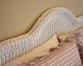 white wicker bed (headboard detail)