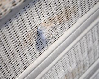 white wicker chest of drawers and mirror (detail)