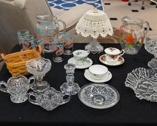 Several vintage pitcher and glass sets!  Adorable.