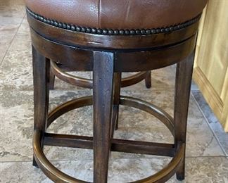 Theodore Alexander Leather Swivel Stools	25x16in diameter	
