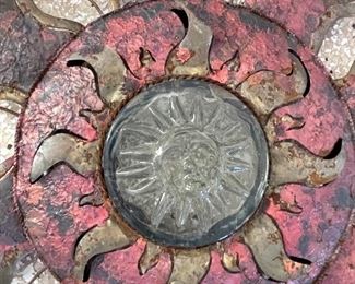 Metal and glass sun wall decor	44in in diameter	
