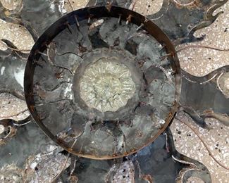 Metal and glass sun wall decor	44in in diameter	
