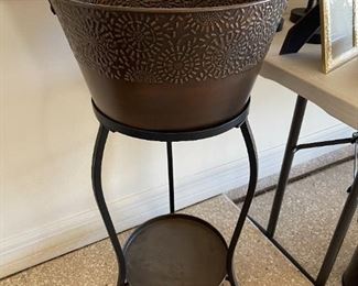 Metal planter/ice bucket with stand decor	34 in tall 18 in diameter	

