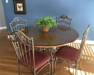 Nice metal Round dining table (glass cover on table) with (4) metal cushioned chairs
