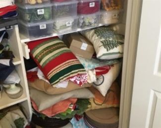 Additional bedroom Closet is packed with fabrics, pillows, sewing a& craft items and more