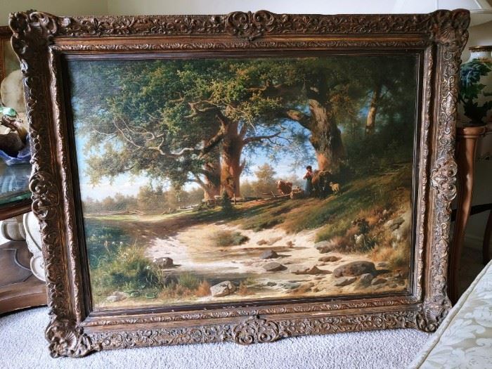 Item #72. Beautiful large 19th Century oil painting on canvas - French countryside scene depicting a young women with cows and sheep resting under large trees near some water. Painting was recently cleaned and lined - signature not found however we think this work is very similar to French artist Charles Ceramano (1829-1909) - painting measures approx. 31 7/8" - 44 1/8" frame is 40" x 52"  - $4,000