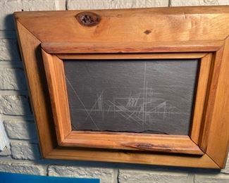 Etched converging lines on slate