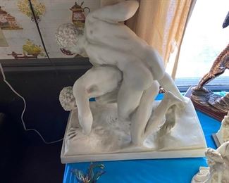 The Wrestlers -- replica of statue in Uffizi Museum a position called Pankration similar to contemporary Mixed Martial Arts -- the "Cross-Body Ride"