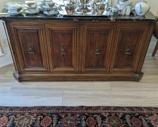 Matching sideboard, from Unique Furniture Co., Raritan, NJ.