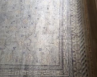 Corner detail and subtle coloring of the Turkish Oushak rug.