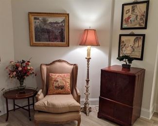 Wonderful silk upholstered wingback armchair, by Meyer, Gunther, Martini - NYC, with down-filled cushion, silverplated floor lamp, vintage mahogany RCA Victor TV cabinet, mahogany/brass tray table and nicely framed artwork.