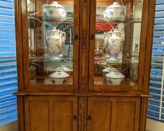 Matching lighted china cabinet, by Ashley Home Furniture.