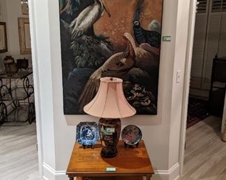 Large, original oil painting of birds at play in garden, doing what birds like to do. Vintage Henredon end table, with single drawer, hand-painted Asian porcelain table lamp, blue/white porcelain dish and metal/porcelain tobacco leaf bowl, w/metal base, for Neiman-Marcus.