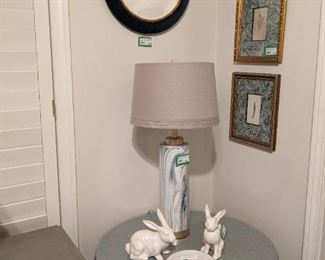 Skirted plywood table, w/glass top, pair of glazed ceramic bunnies (Eater's coming!) pair of framed/marbleized matt botanicals and a wonderful, vintage intaglio bust of profile of Greek female. The next pic gives much better detail - quite beautiful, in person.