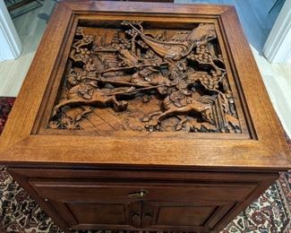 One of a pair of matching, hand-carved wood Asian-themed end tables, there's also a matching coffee table. All three pieces have glass tops, but I removed it here, so you can see the carving details.