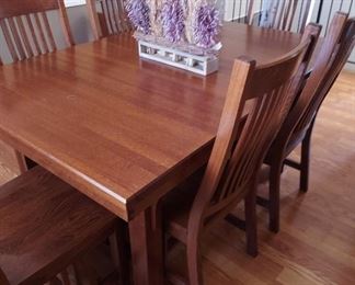 Oak Express mission-style dining room table + 6 chairs