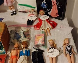 Barbie dolls, some old, some new