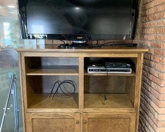 2 flat screen TVs . 2 are Vizio smart TVs and one is an LG