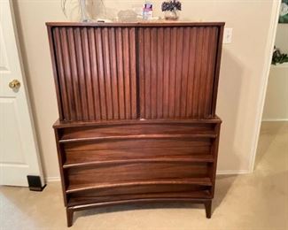 Bedroom set includes matching tall boy / gentleman's chest, long dresser with mirror, 1 nightstand and headboard