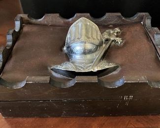 Wooden box with a knight on it