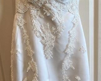 Beautifully beaded consigned wedding dress - size 8