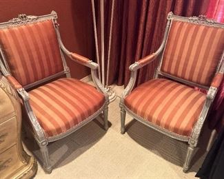 Formal upholstered arm chairs