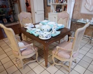 Breakfast table with 4 arm chairs $350.