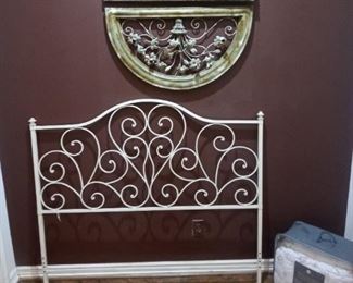 Iron headboard $25. Two pc. Wall decor $50. Bedding $20.