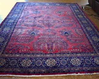 Handknotted red and blue Persian rug. Approx. 9' x 12'