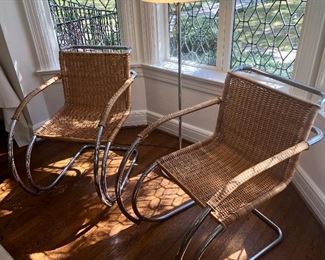 Pair of Mies van der Rohe cantilever cane + chrome armchairs.   32H x 22W x 31D (seat 17H, arm 25H).  Very good condition.  A few areas where cane is loose (see photos).   $1000 each   
