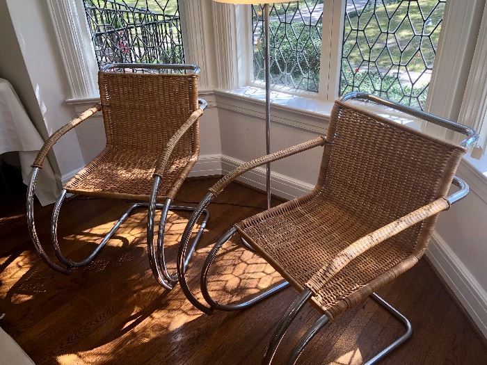 Pair of Mies van der Rohe cantilever cane + chrome armchairs.   32H x 22W x 31D (seat 17H, arm 25H).  Very good condition.  A few areas where cane is loose (see photos).   $1000 each   