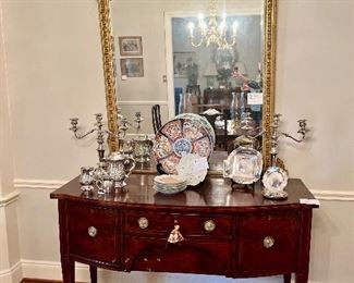 Antique Mahogany Server
Giltwood Louis XVI mirror
Imari charger
Pair Silver-plate candelabra
