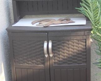 Outdoor storage/potting table/cabinet.