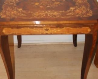 Italian games table with removable top to show under side with back gammon, chess, mah jong, and roulette.