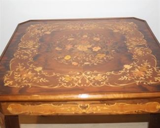 Italian games table with removable top to show under side with back gammon, chess, mah jong, and roulette.