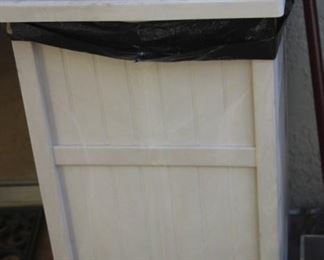 Outdoor/garden trash can.
