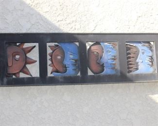 Sun and moon metal wall art.