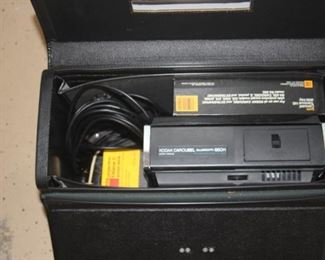 Slide Kodak Carousel kit in leather carrying case.