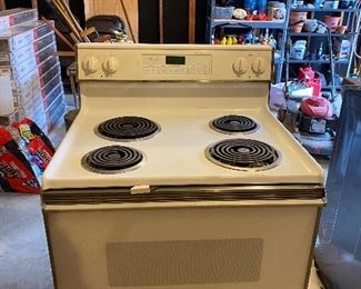 Stove - works- moved to garage for easy pick up