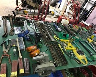 more hand tools and if you look closely... You could start a GREAT collection of SPRINKLERS (althou newer sprinklers) your yard will never be dry!!!