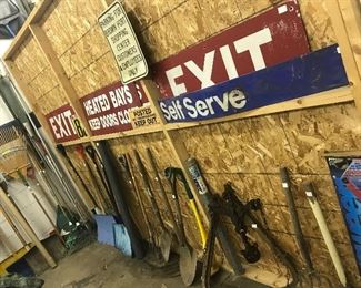 signs and long handle lawn tools