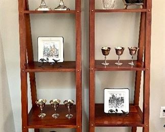 $100/ each. Wooden leaning display shelves, very sturdy! 18w 67h 18d