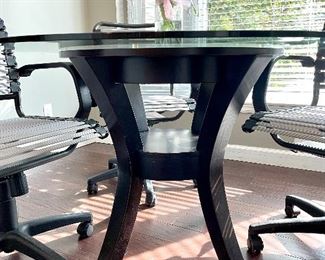 $200 Glass top functional table, 48 inches round. 