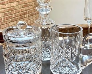 $54 Waterford candy jar, $58 Waterford decanter, $52 Waterford Lismore pitcher. 