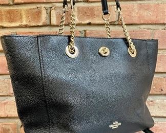 $140 Coach leather tote, looks brand new! Approx. 14 x 9