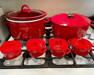 $20 Red crock pot (SOLD) . $100 Chantal enameled cast iron Dutch oven. $38 Martha Stewart stonewear cocettes, set of 4. 
