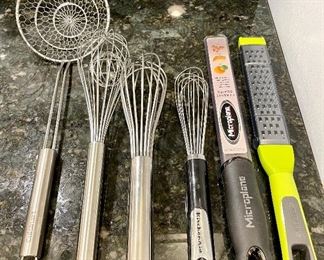 Lots of stainless steel kitchen utensils, Cuisinart, Microplane, Calphalon and more!