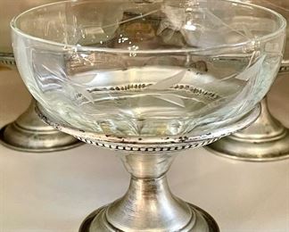 $160/ set of 6, sterling silver dessert cups (one is missing the glass insert).