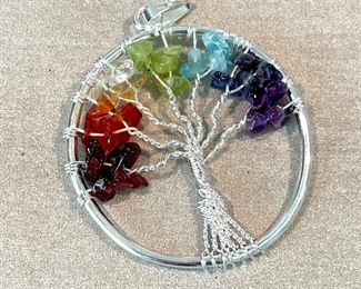 $14 Rainbow colored pendant.