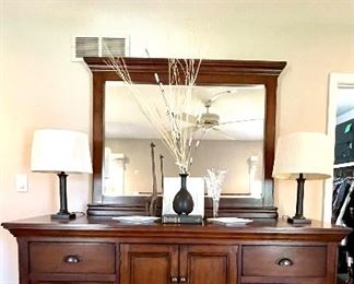 $350 Dresser with mirror. Dresser is 69w 22d 43H, Mirror is 49 x 40. You move!